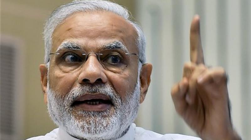 Modi giving a warning and showing his finger photo
