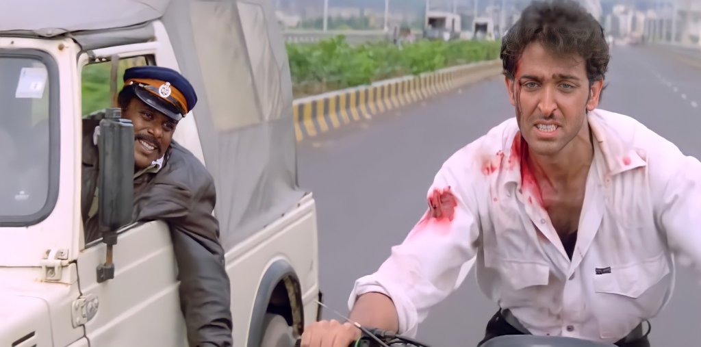 Hrithik Roshan in bike being chased by a police car meme