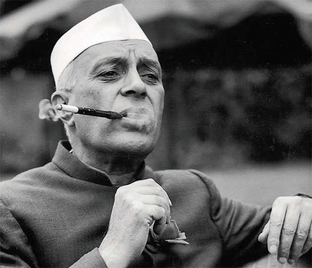 Jawaharlal Nehru smoking a cigar