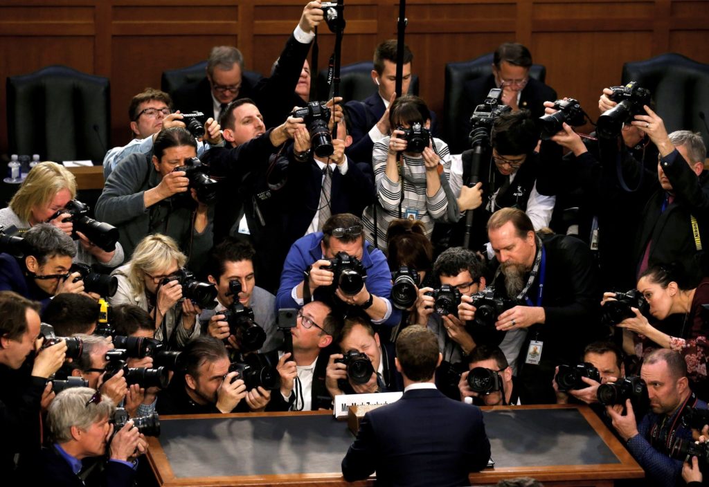 Zuckerberg surrounded by photographers meme template