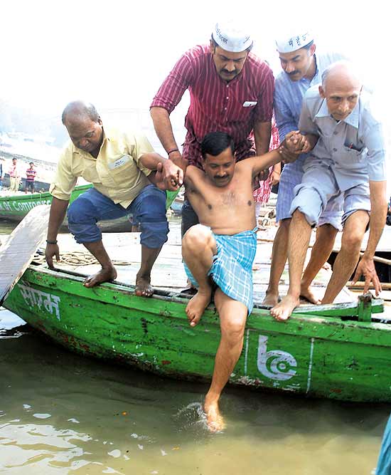 arvind kejriwal taking a dip in river ganga varanasi