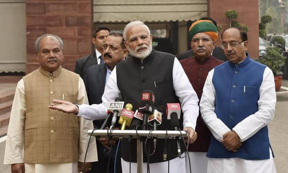 Narendra Modi in a press meeting outside parliament funny hand gesture