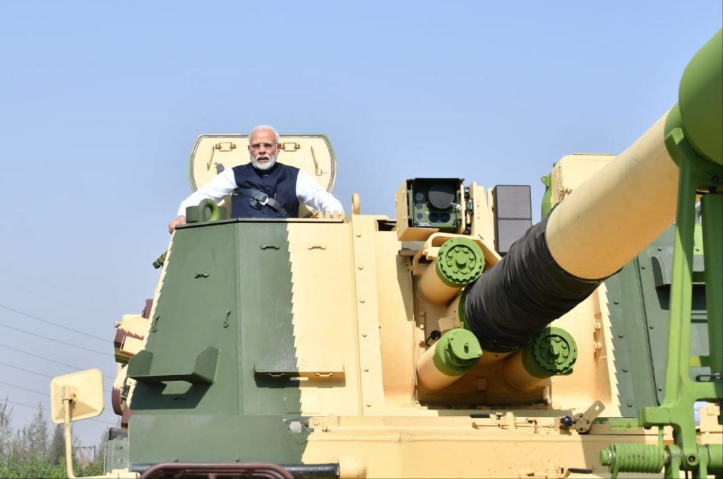 PM Narendra Modi takes a ride in a tank photo
